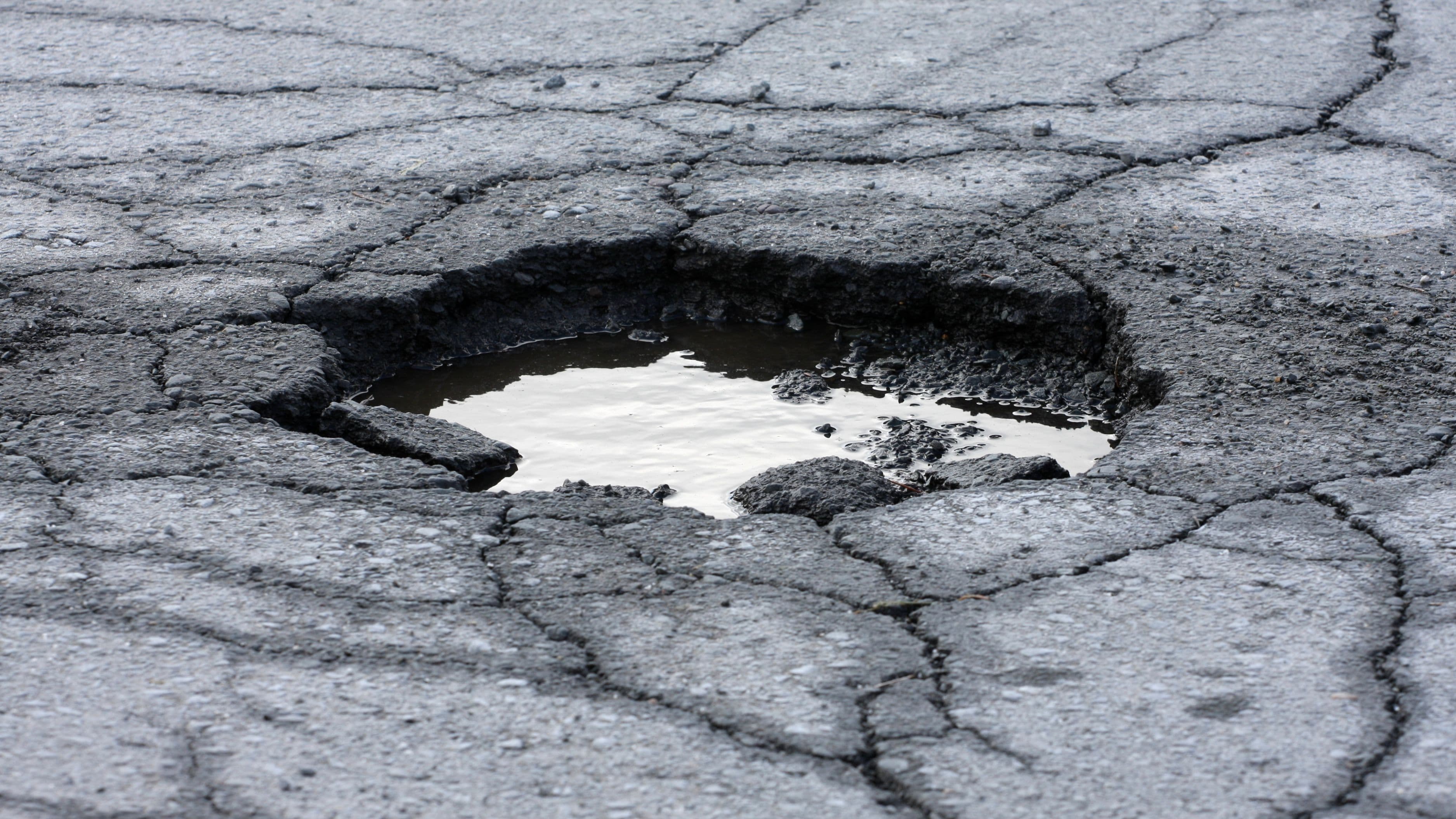 What Causes Potholes in Asphalt Driveways and How to Fix Them
